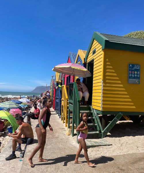 The colorful huts on the beach of Muizenberg, a great photo op on a Cape Town itinerary.